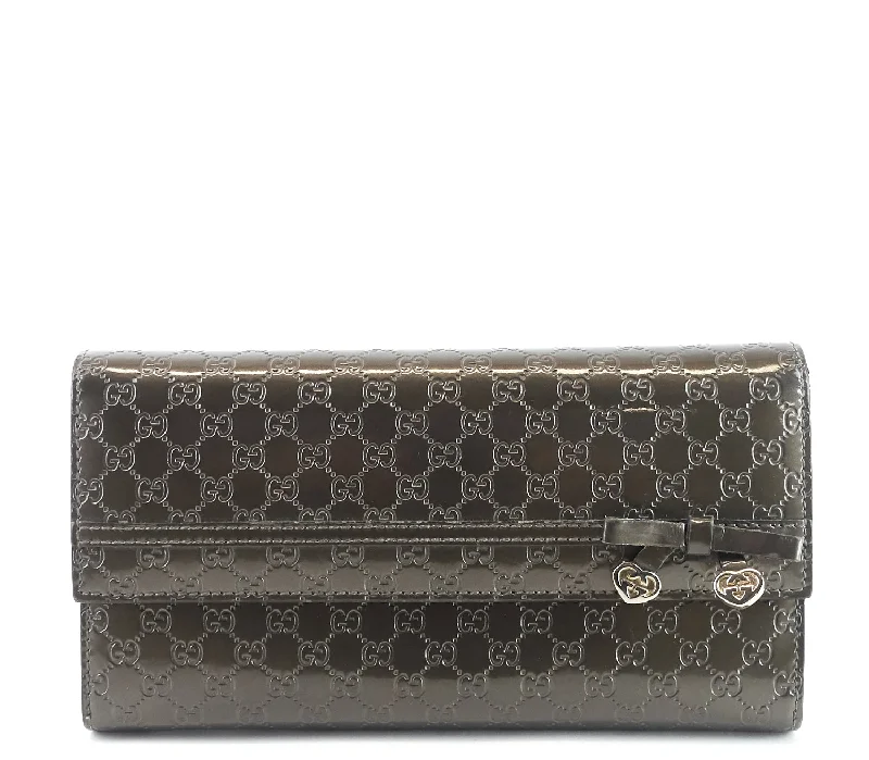 Women Gucci Sylvie bags with a leather - wrapped handleCandy Shine Microguccissima Patent Leather Wallet