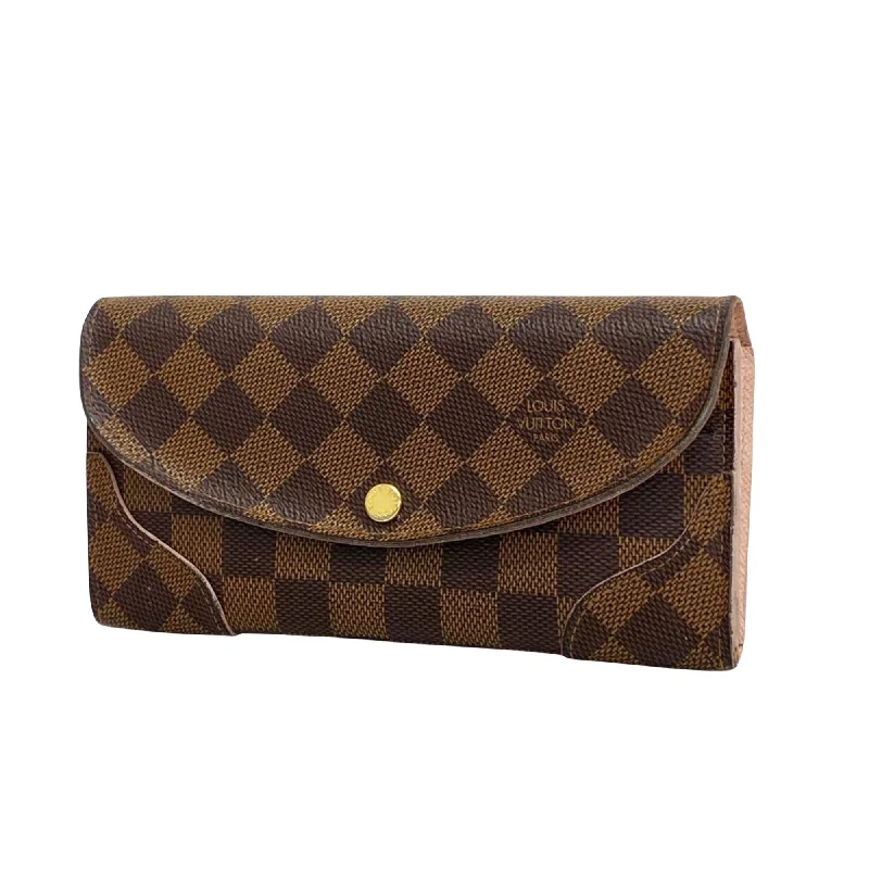 Louis Vuitton Alma bags with a monogram - embossed leather surfaceLOUIS VUITTON Caissa Wallet