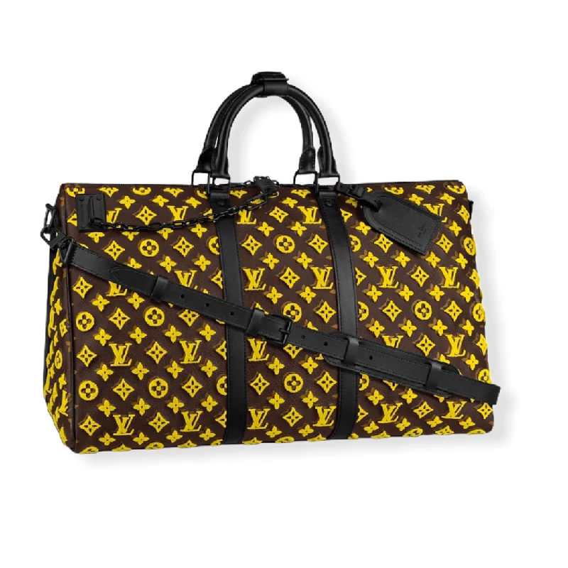 Ladies Louis Vuitton handbags with a detachable coin purse insideLouis Vuitton Keepall Triangle Bandoulière 50 Yellow