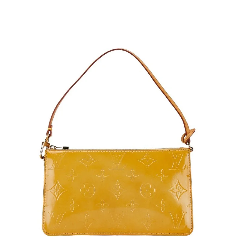 Louis Vuitton Alma bags with a monogram - embossed leather surfaceLOUIS VUITTON Lexington Clutch Bag