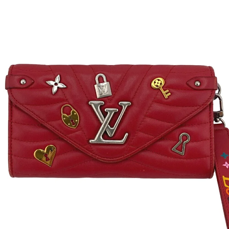 Ladies Louis Vuitton Capucines bags with gold - toned hardwareLOUIS VUITTON New wave Wallet