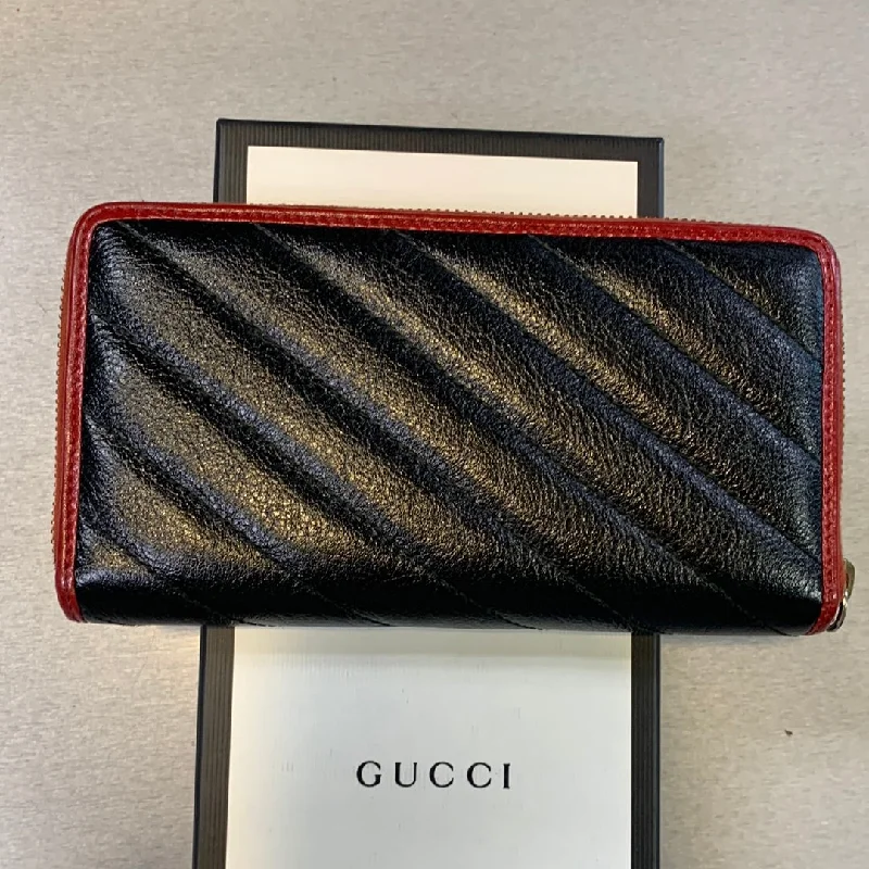 Women Gucci Sylvie bags with a crystal - embellished web stripeGucci GG Marmont Zip Around Wallet