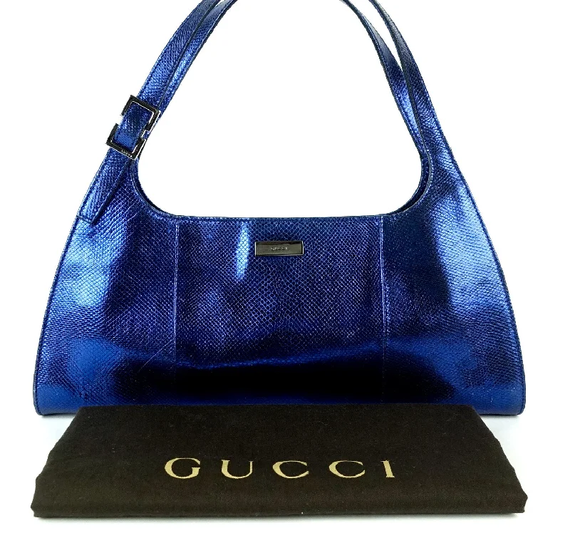 Women Gucci Sylvie bags featuring the signature web stripeSnakeskin Leather Shoulder Bag