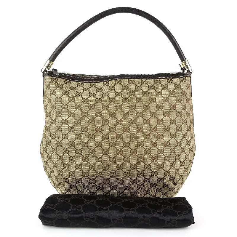 Women Gucci Sylvie bags with a leather - wrapped handleMonogram Canvas Hobo Bag