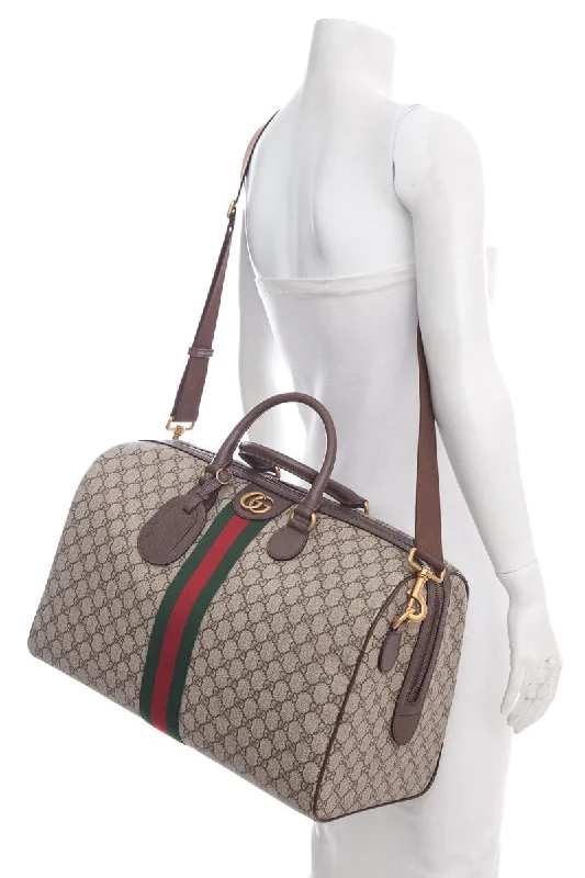 Gucci tote bags for women with a printed Gucci logoGucci Brown Canvas  Monogram Duffle Bag