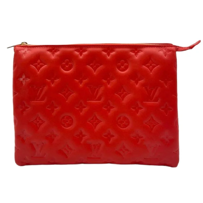 Louis Vuitton handbags with a patent - leather finish for a shiny lookLouis Vuitton Red Coussin Bag