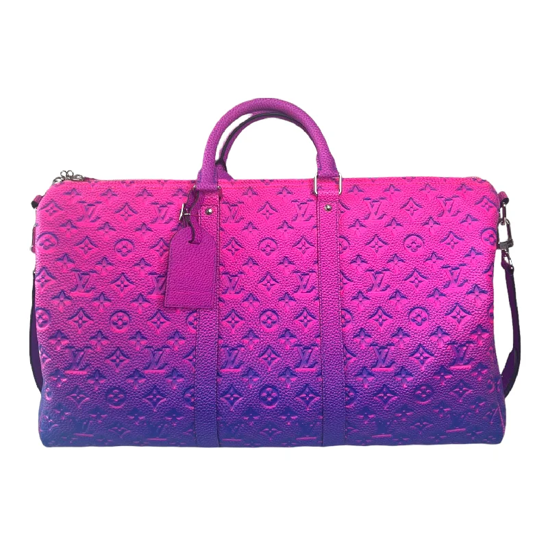 Ladies Louis Vuitton Petite Malle bags with a star - shaped charm for cutenessLouis Vuitton Pink Fluorescent Keepall 50