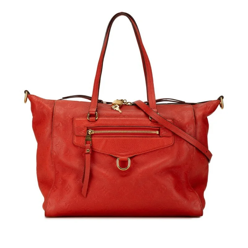 Louis Vuitton Twist bags with the iconic LV - turnlock closureLOUIS VUITTON Lumineuse Handbag