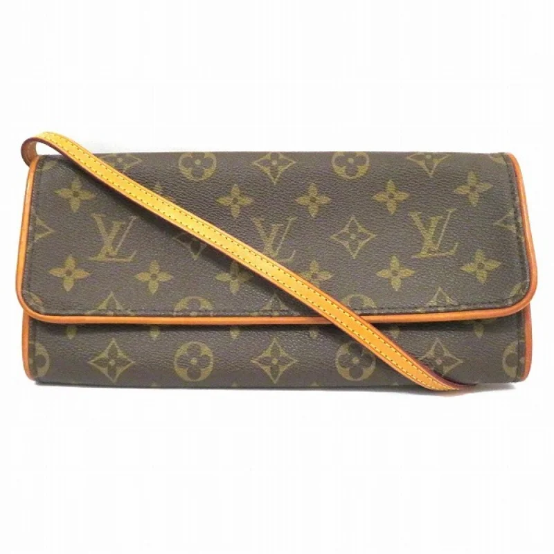 Ladies Louis Vuitton shoulder bags with a single - handle silhouetteLOUIS VUITTON Twin Clutch Bag