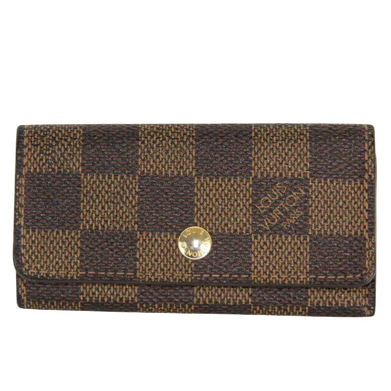 Louis Vuitton crossbody bags with a woven leather strap for textureLOUIS VUITTON Multicles Wallet