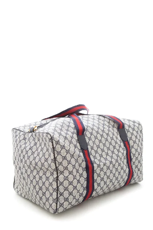 Women Gucci crossbody bags with a keychain holderGucci Navy & Red Web Trim GG Coated Canvas Duffle