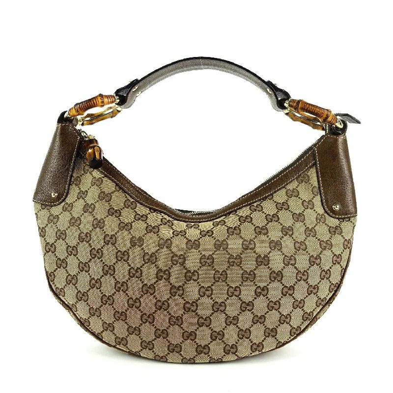 Ladies Gucci shoulder bags with a tassel decorationMonogram Canvas Bamboo Rings Hobo Bag