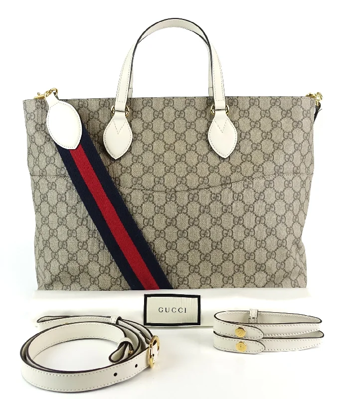 Ladies Gucci handbags with a detachable coin purse insideSupreme Monogram Canvas Top Handle Diaper Bag with Straps