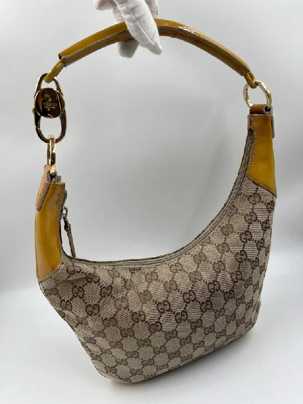 Women Gucci bags with a chain - link trim and a leather bodyVintage Gucci Croissant Bag