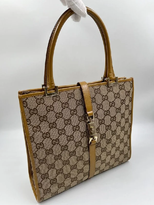 Gucci tote bags for women with a printed Gucci logoVintage Gucci Tote Bag