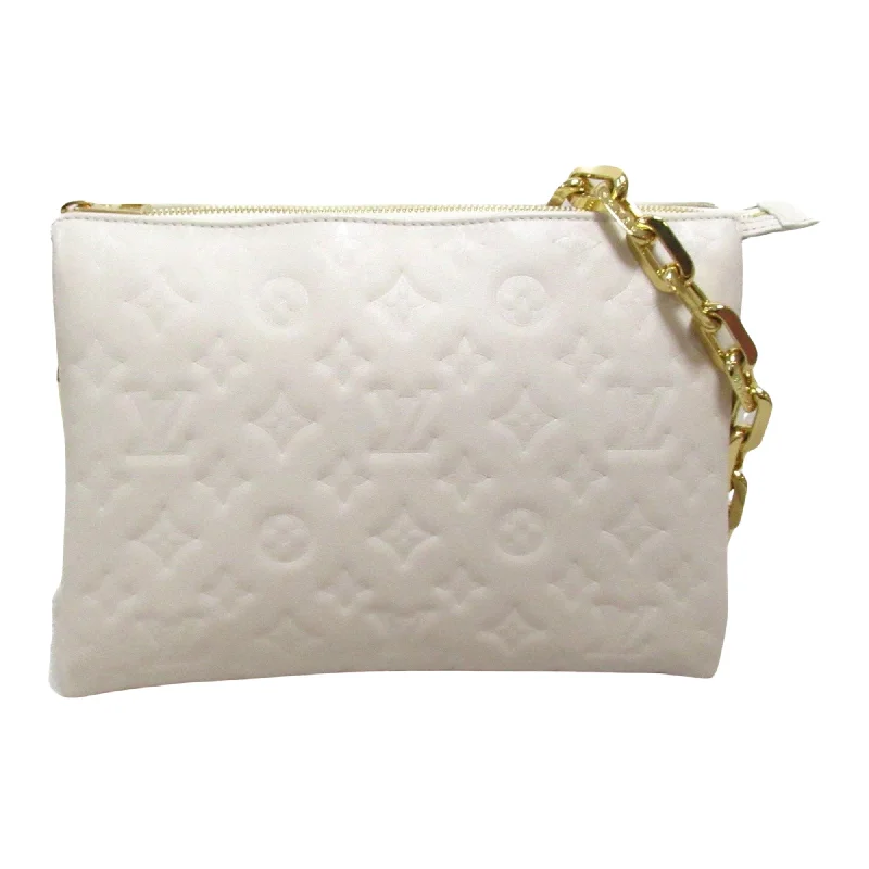 Louis Vuitton Speedy bags in monogram canvas for a classic lookLOUIS VUITTON Coussin Shoulder Bag