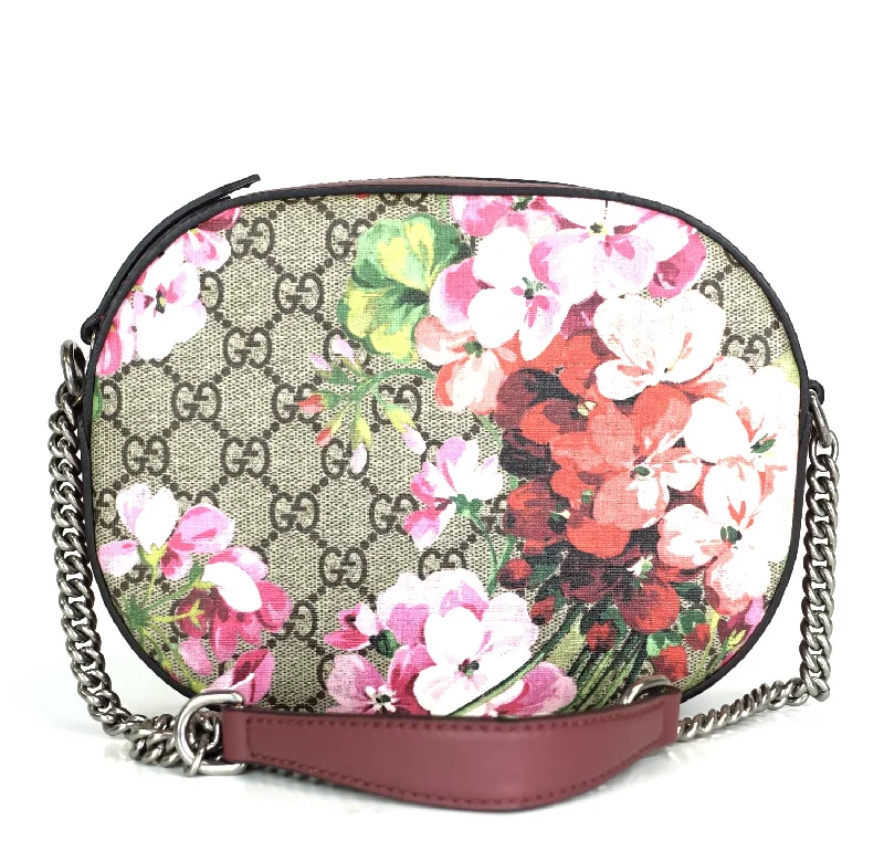 Women Gucci bags with a magnetic snap closure for easy accessBlooms Monogram Coated Canvas Mini Crossbody Bag