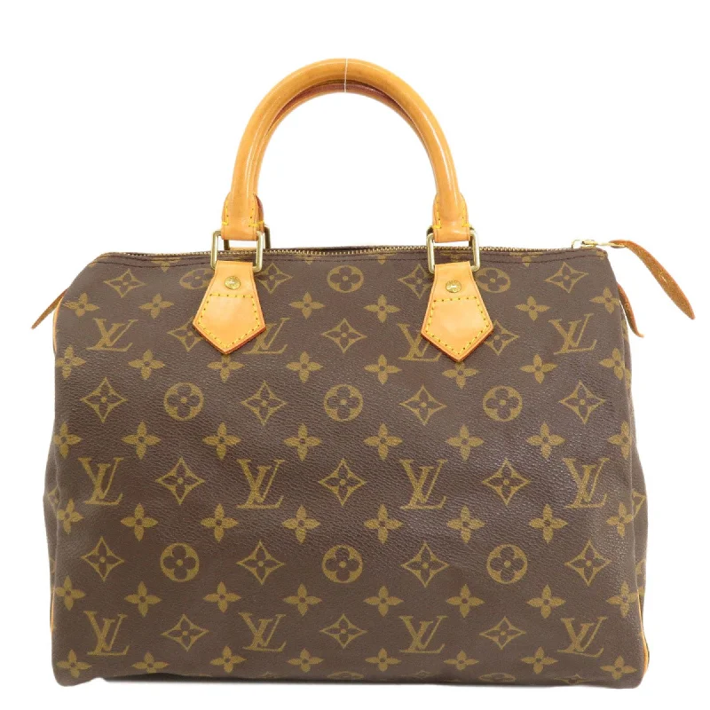 Louis Vuitton bags with a snap - button closure and a decorative charm for styleLOUIS VUITTON Speedy 30 Travel