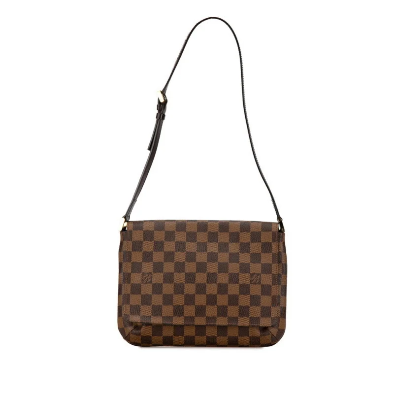 Louis Vuitton Alma bags with a monogram - embossed leather surfaceLOUIS VUITTON Musette Tango Shoulder Bag