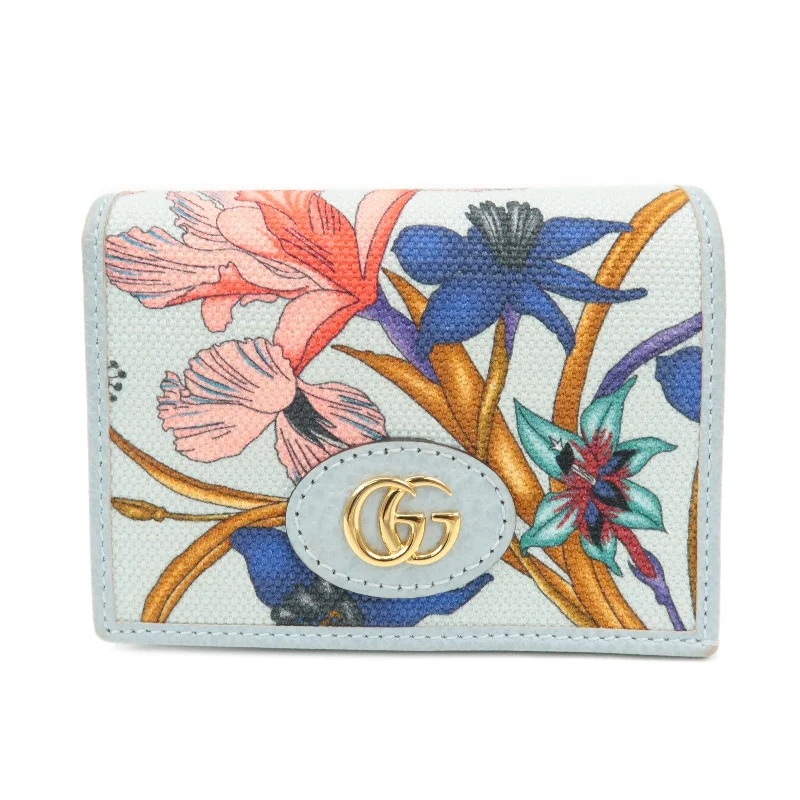 Women Gucci bags with a snap - button closure and a decorative charmGUCCI GG Marmont Flora Canvas Leather Bi-fold Compact Wallet