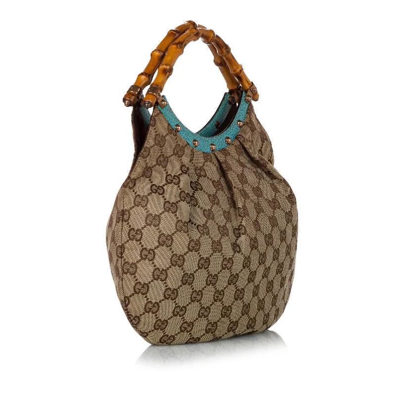 Gucci Marmont bags for women with quilted leather exteriorsGucci Bamboo GG Canvas Handbag (29250)