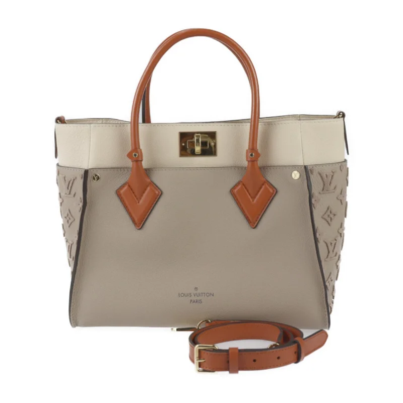 Medium - sized Louis Vuitton tote bags for work and shoppingLOUIS VUITTON On my Side Handbag