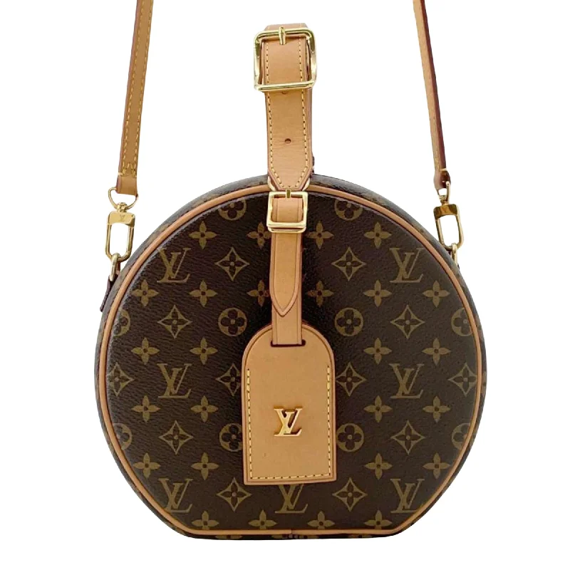 Ladies Louis Vuitton Petite Malle bags with a star - shaped charm for cutenessLOUIS VUITTON Petite Boîte À Chapeau Handbag