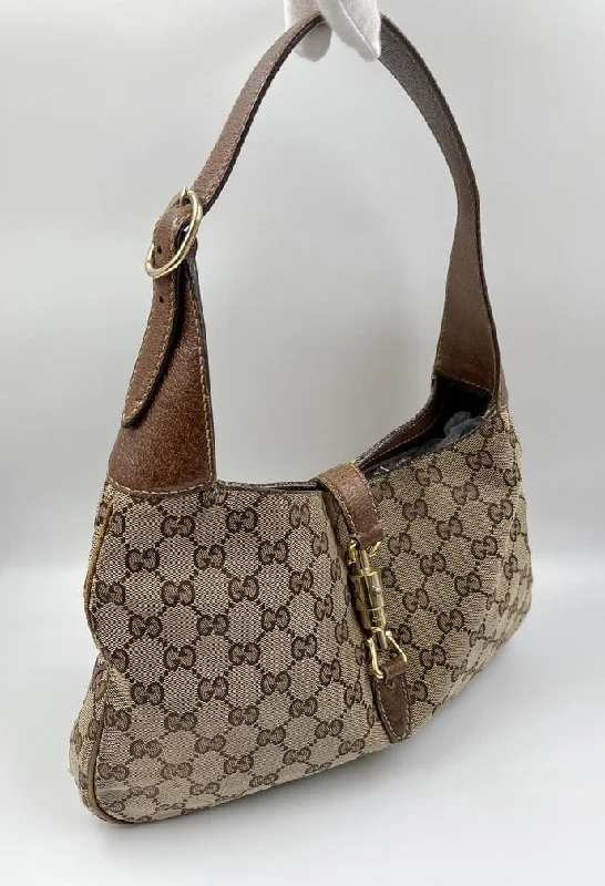 Women Gucci crossbody bags with a keychain holderVintage Gucci Jackie Bag