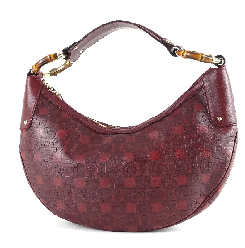 Women Gucci bags with a zippered interior pocketEmbossed Leather Bamboo Ring Hobo Bag