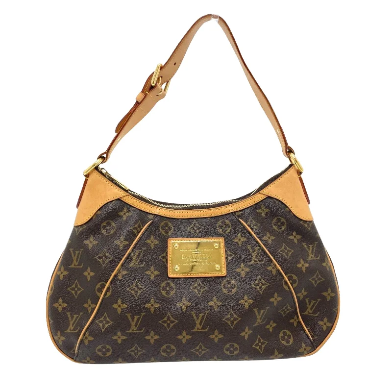 Louis Vuitton Twist bags with the iconic LV - turnlock closureLOUIS VUITTON Thames Shoulder Bag