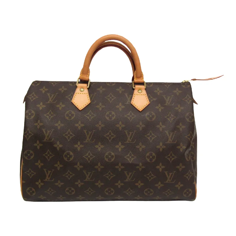 Louis Vuitton Twist bags with a crystal - embellished LV - turnlockLOUIS VUITTON Speedy 35 Handbag