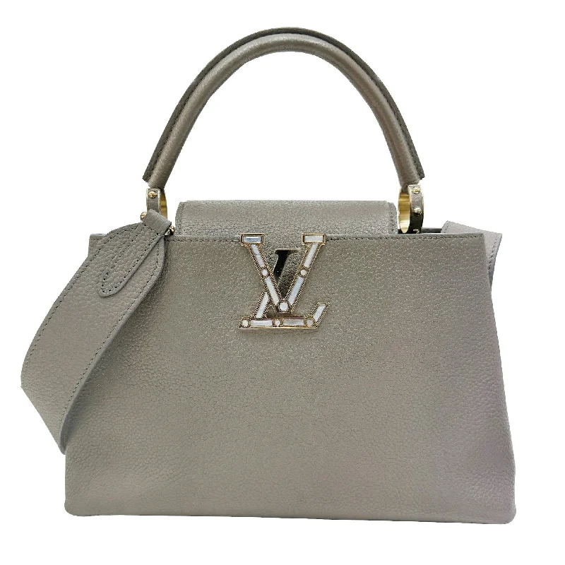 Louis Vuitton handbags with a back - zip pocket for storing valuablesLOUIS VUITTON Capucines Handbag