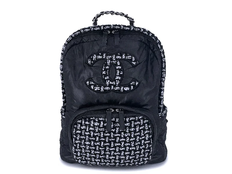 Chanel bags in luxury boutiques worldwideChanel Black Tweed Coco Neige Logo Backpack Bag