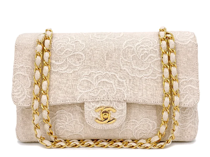 Chanel bags with iconic stitching detailsChanel 1997 Cream White Linen Camellia Medium Double Flap Bag 24k GHW