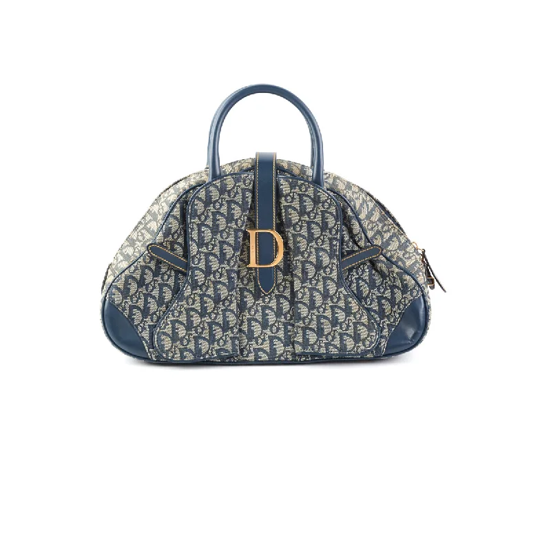 Christian Dior Saddle bags with a patent leather finish for a shiny lookDior Trotter Boston Bag Navy