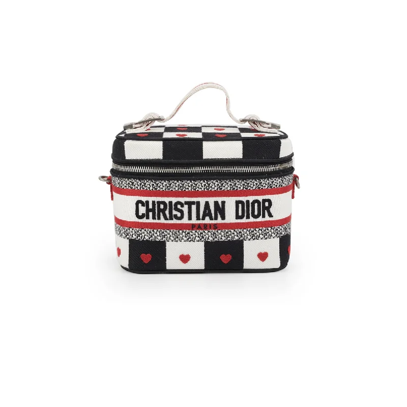 Christian Dior backpacks with a sleek, minimalist silhouetteDior Diortravel Small Vanity Case Canvas Dioramour