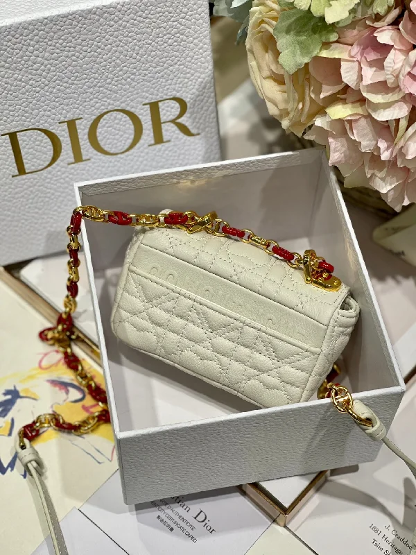 Christian Dior handbags with a snap - button closure and a decorative buckleChristian Dior - Luxury Bags  717