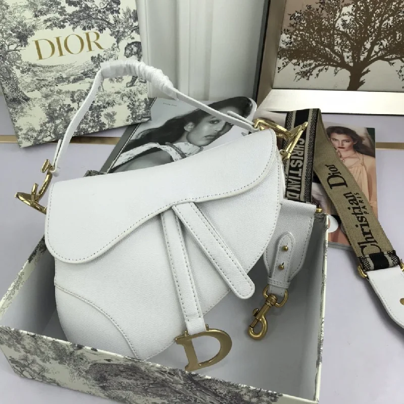 Christian Dior Saddle bags with a distressed leather finishGlitzyBags - Designer bags by Dior 108