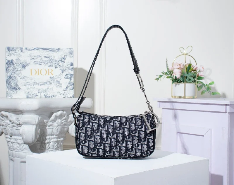 Christian Dior tote bags with a printed Dior logo on the frontGlitzyBags - Designer bags by Dior 159