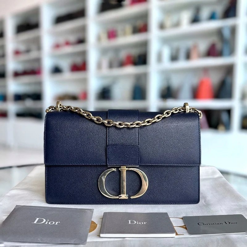 Christian Dior backpacks with a sleek, minimalist silhouetteMontaigne 30 East West Grained Calfskin Dark Blue LGHW