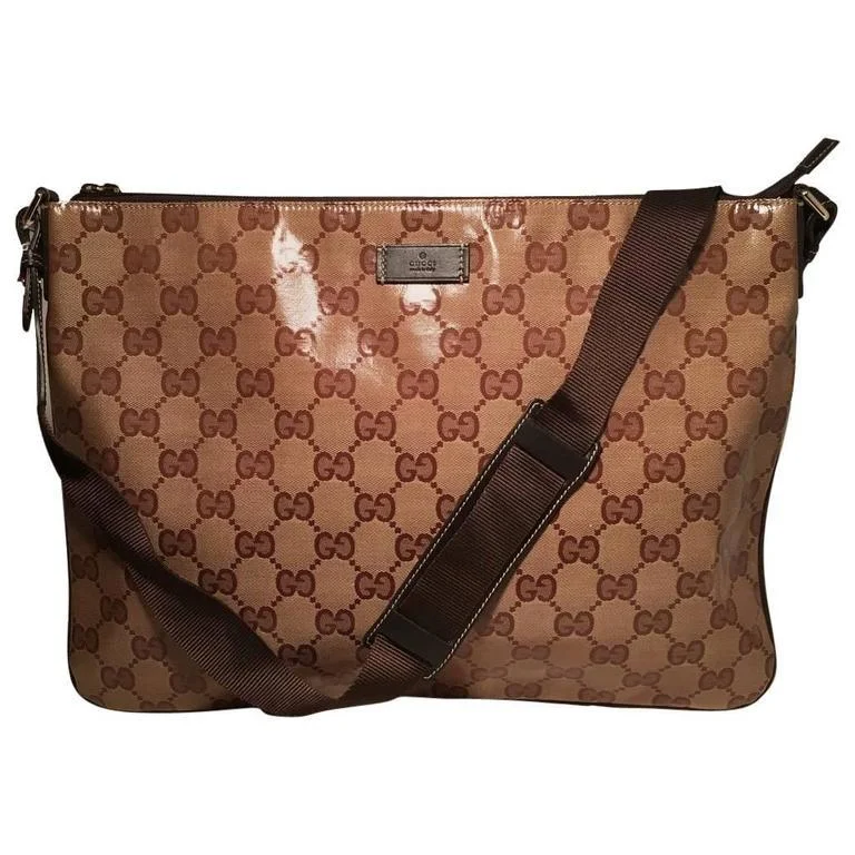 Ladies Gucci Dionysus bags with a chain - link shoulder strapGucci XL Coated Monogram Canvas Slim Messenger Shoulder Bag